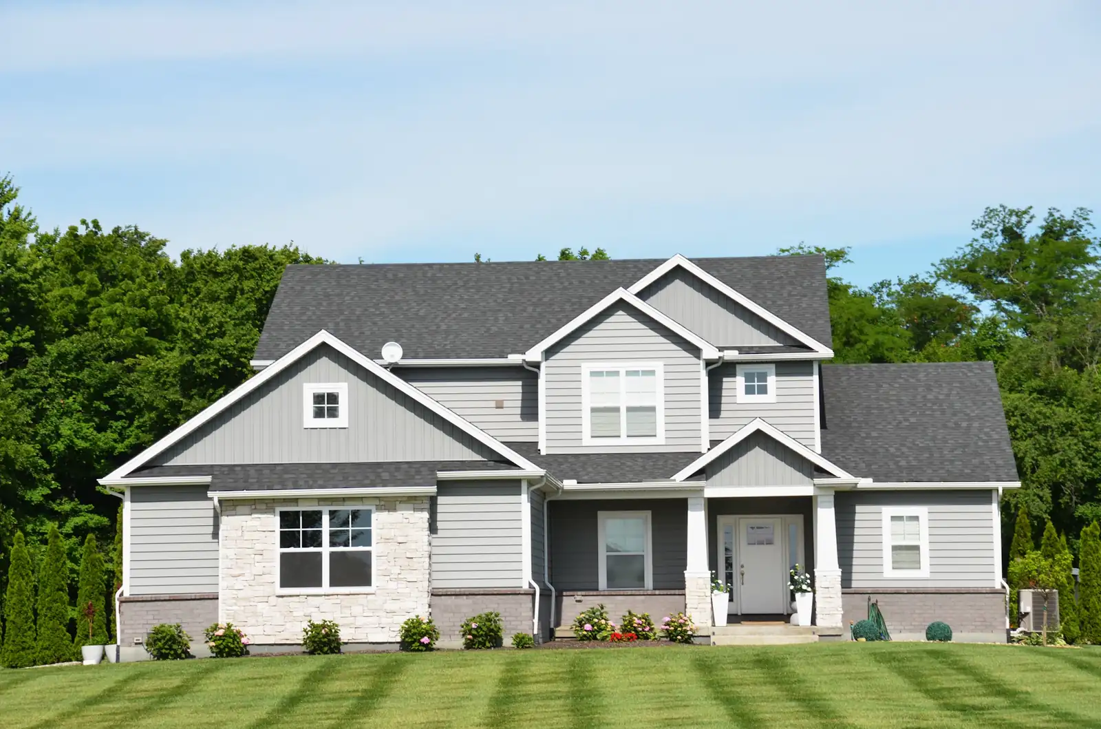 Two-story home with a new roof